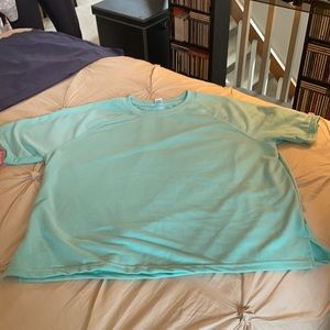 Light green, short sleeve sweatshirt.